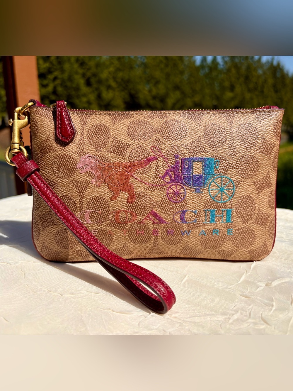 COACH Wrist Wallet In Signature Canvas With REXY And Carriage 88771